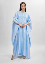 ⁦فستان نسائي طويل بنسيج لامع⁩ - الصورة ⁦2⁩