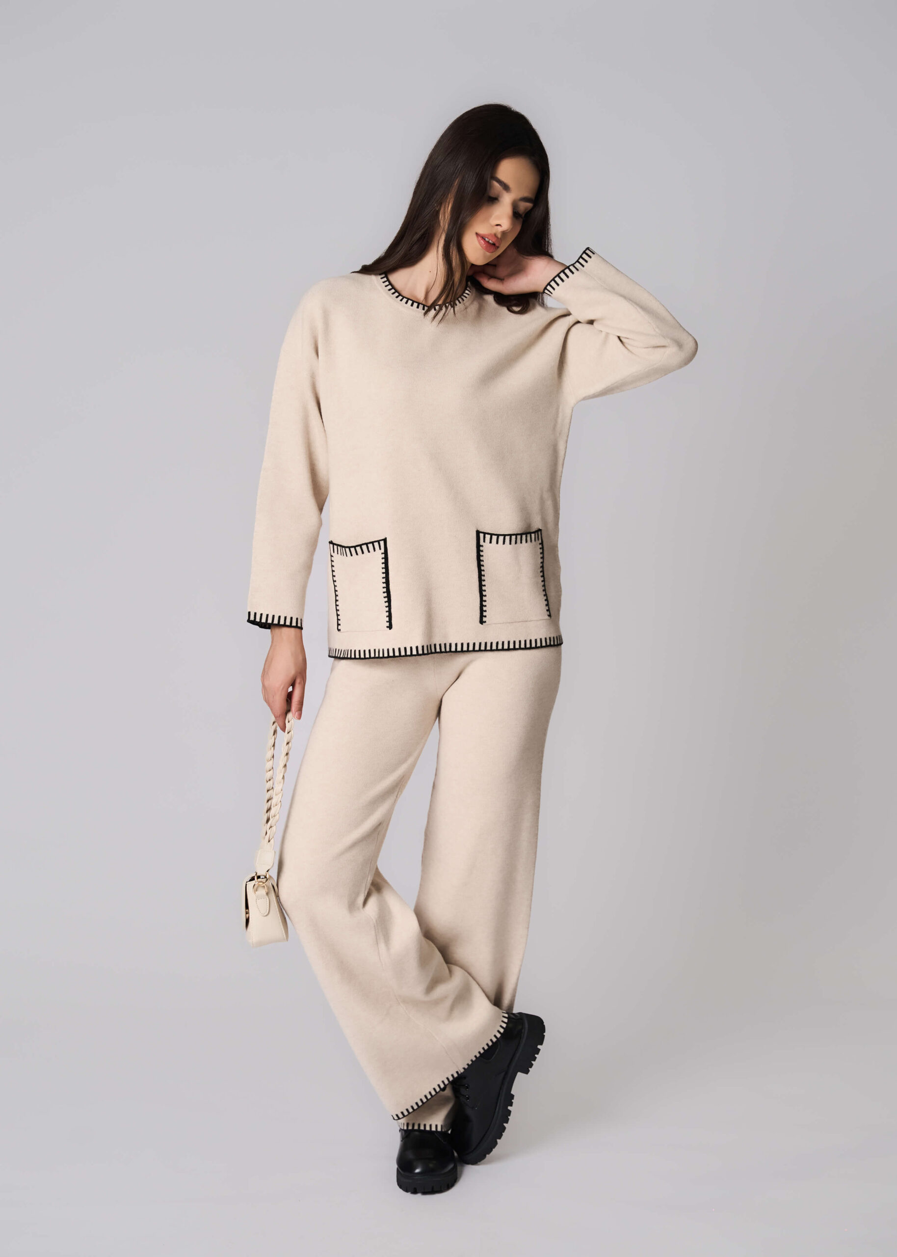 6225216025784-x بلوزة نسائي بنسيج محبوك سادة - الصورة 1